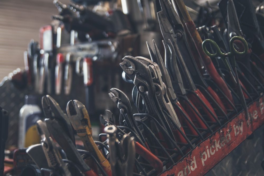 Professional hand tools arranged for HVAC maintenance work